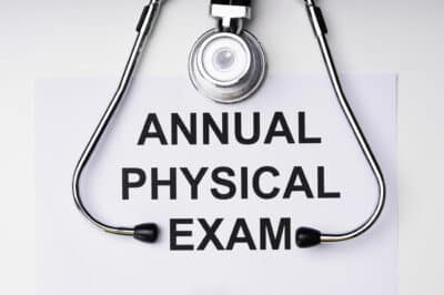 Stethoscope and a piece of paper for annual physical exams.